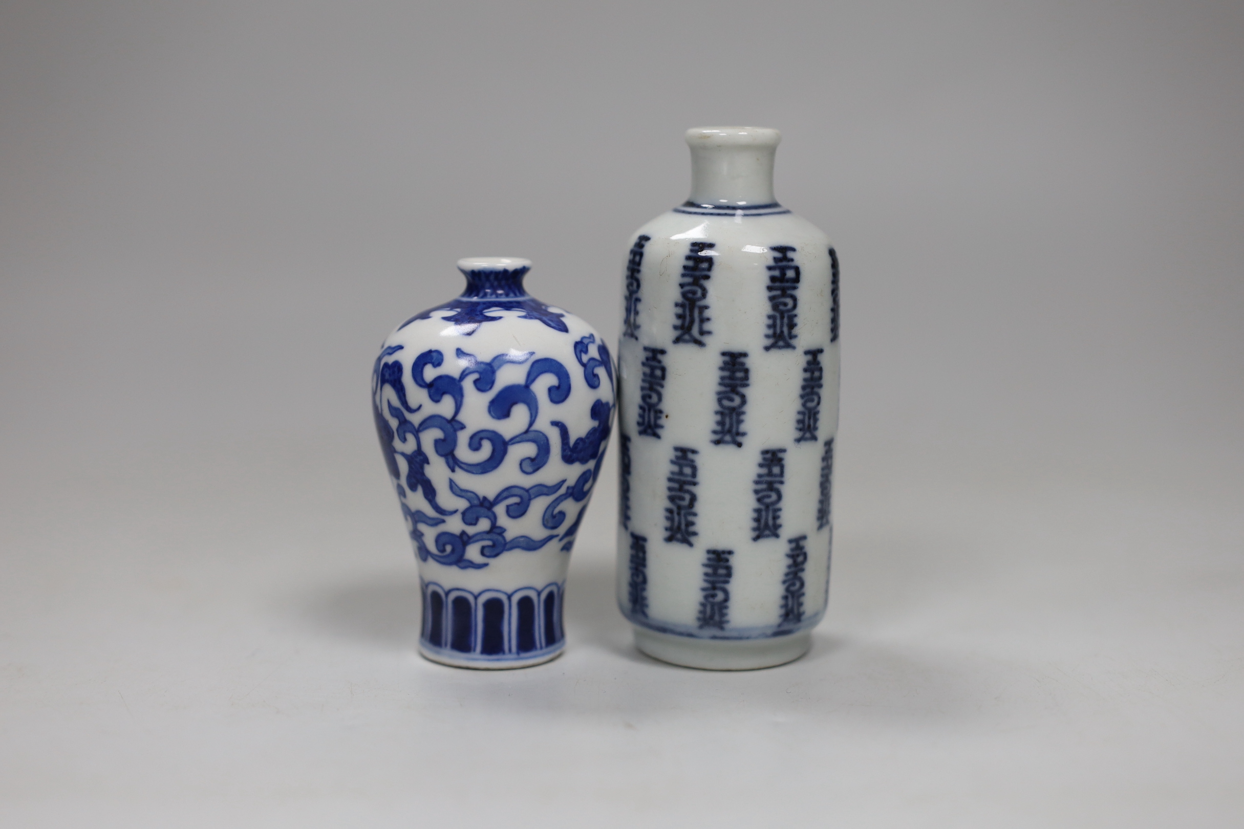 Two Chinese blue and white snuff bottles, tallest 9cm high